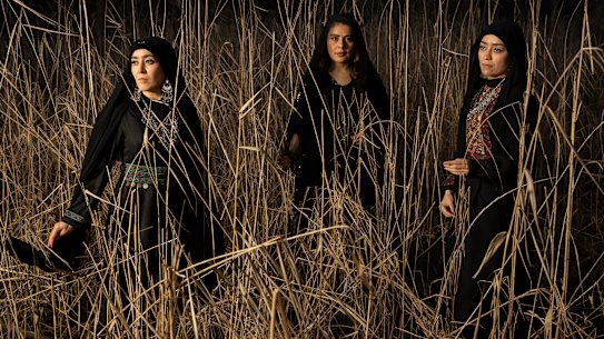 Sisters Narges and Mahboubeh Alizadeh with Saba Vasefi (centre).  