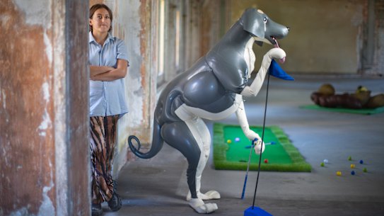 Swingers curator Grace Herbert with Saeborg in costume.