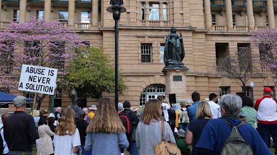 A crowd joins the Six Years Too Long rally to call for refugees in detention to be brought to Australia.