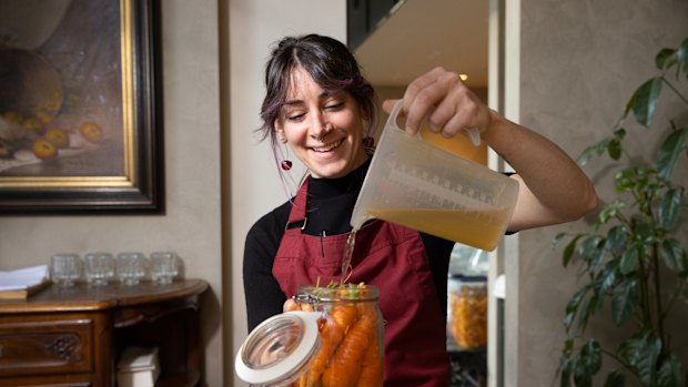 Caitlin Koether pickles carrots.