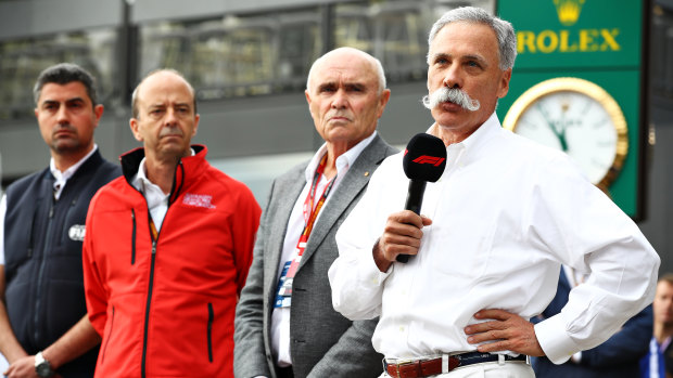Chase Carey (right), the CEO and executive chairman of the Formula One Group.