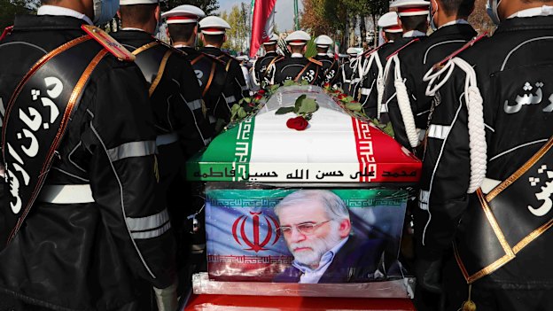 The Iranian Defence Ministry, military personnel stand near the flag-draped coffin of Mohsen Fakhrizadeh, a scientist who was killed on Friday, during a funeral ceremony in Tehran, Iran.