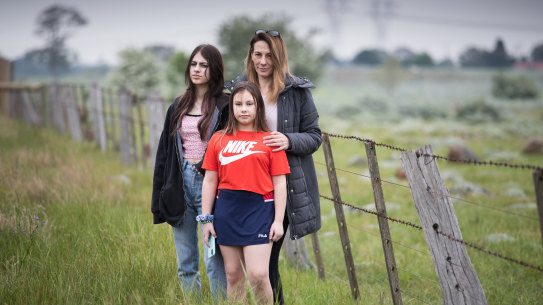 Rose Petsinis with daughters Alexia, 10, and Lisha, 14 on Wednesday.