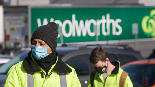 Workers at the Laverton North warehouse on Monday.