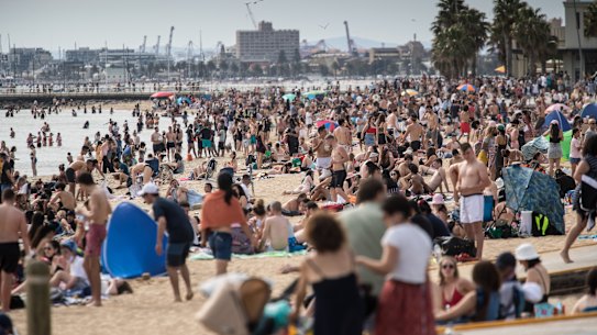 Thousands flocked to St Kilda beach as the mercury climbed on Melbourne Cup Day.  