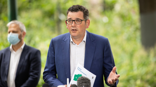 Premier Daniel Andrews and Chief Health Officer Brett Sutton unveil the new border entry scheme on Monday.