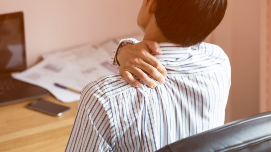 Office neck pain man generic injury back desk. Picture: Shutterstock
