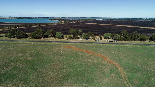 The scar on the landscape left after the stones were removed.