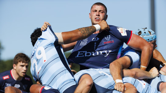Melbourne Rebels lock Josh Canham is caught in a maul against NSW Waratahs.