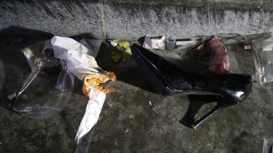 The belongings of victims are seen at the scene of a deadly stampede in Seoul, South Korea. 
