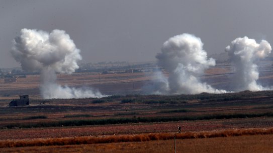 Smoke billows from targets inside Syria during bombardment by Turkish forces Thursday.