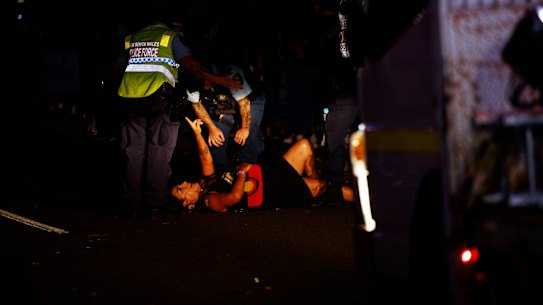 Lidia Thorpe is removed by police after protesting the NSW police float during the Gay and Lesbian Mardi Gras parade.