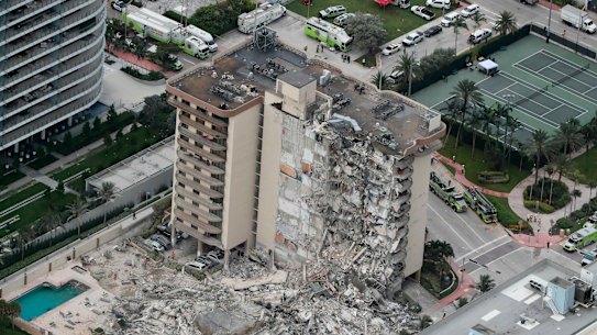 An aerial photo shows part of the 12-storey oceanfront apartment building that collapsed. 