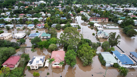 Houses surrounded by floodwater in Lismore in March.