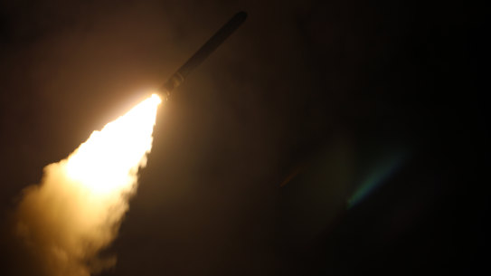 The guided-missile destroyer USS Laboon (DDG 58) fires a Tomahawk land attack missile into Syria in 2018.