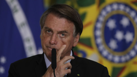 Under pressure: Brazilian President Jair Bolsonaro on Tuesday.