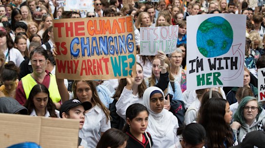 Students take a day off school to protest at a climate change rally in Sydney in March.