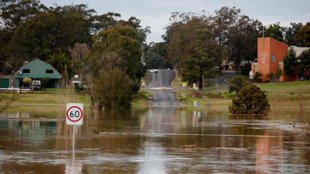 Floodwaters soak Sydney’s north-west as rains ease after deluge