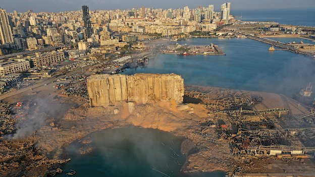 A drone picture shows the scene of an explosion that hit the seaport of Beirut, Lebanon, Wednesday, Aug. 5, 2020