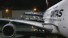 A Qantas jet parked at LAX where engineers are trying to form a union to bolster their case for pay increases.