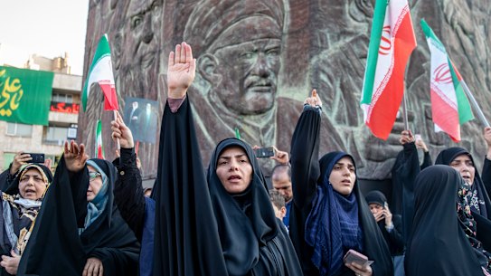 Iranians participate in an Eid al-Ghadir ceremony and a protest march on Saturday against the Israeli attacks.