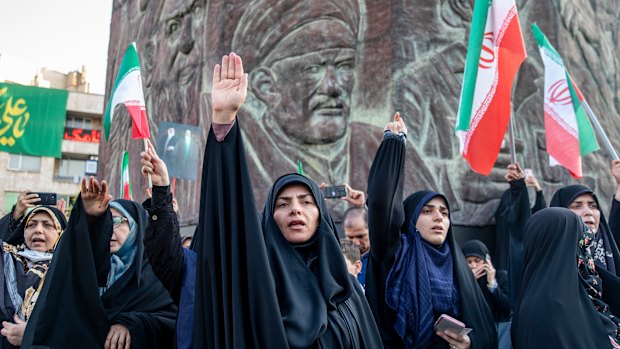 Iranians participate in an Eid al-Ghadir ceremony and a protest march on Saturday against the Israeli attacks.