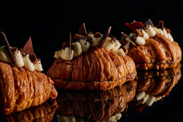 The croissant is topped with mascarpone chantilly cream, tempered chocolate shards, salted cookie crumb and Belgian truffles. 