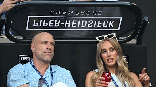 Chris and Bec Judd courtside at Rod Laver Arena on Sunday night.