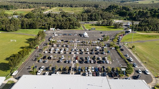 People waiting in cars for COVID-19 testing at Ewingsdale Road, Byron Bay.