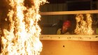 Flaming, not spreading: Engineer Jonathan Barnett’s fire test on Monday. 