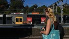 Commuters and trains at Erskineville train station