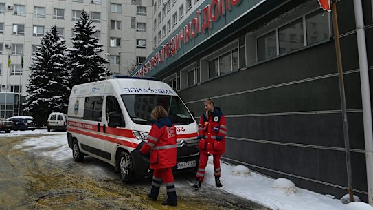 Ambulance officers outside a hospital in Kharkiv, Ukraine, in March.