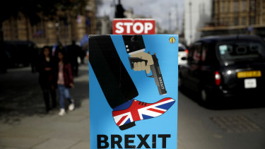 An anti-Brexit placard outside the Houses of Parliament in London.
