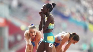 Bendere Oboya (centre) after her heat in the 400m.