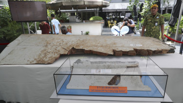 Debris from the missing Malaysia Airlines Flight MH370 on display display at the Day of Remembrance event.