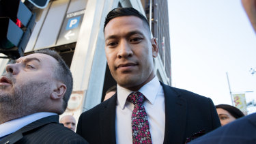 Israel Folau arrives at the Fair Work Commission on Friday for a conciliation meeting.