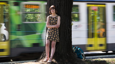 Olympia Sarris takes public transport to work but has an invisible disability: ankylosing spondylitis and says public transport needs to have disability signs that are more inclusive.