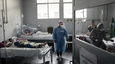 A COVID ward fit 50 patients into a space meant for 12 at a hospital in Tefé, a remote city of 60,000 in Brazil's Amazonas state.