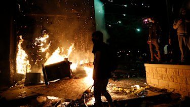 Protesters set fires at the 3rd Precinct of the Minneapolis Police Department.