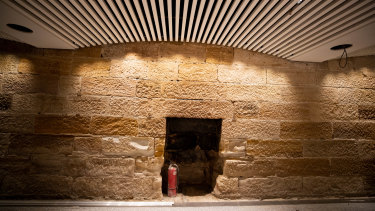 Sandstone walls and an old fireplace discovered  during the renovation. 