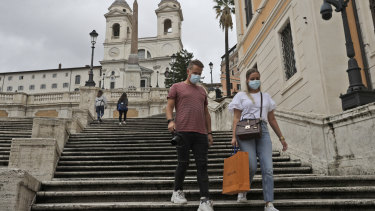 Visitors descend the Spanish Steps in Rome on Tuesday,