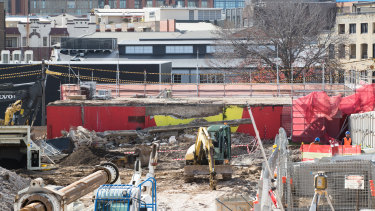 Bulldozers ripped down Redfern's famous Aboriginal flag mural this week.