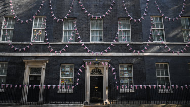 Union Jack bunting was strung across the front of Number 10 Downing Street.