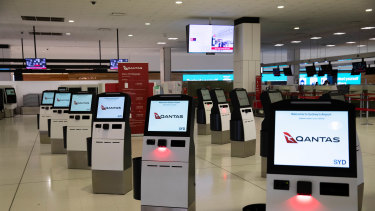 Empty check-in terminals at Sydney International Airport.