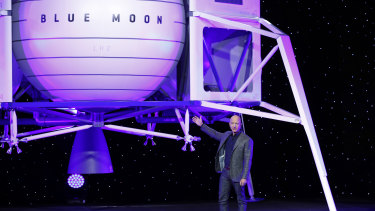 Jeff Bezos in front of a model of Blue Origin's Blue Moon lunar lander on Thursday.