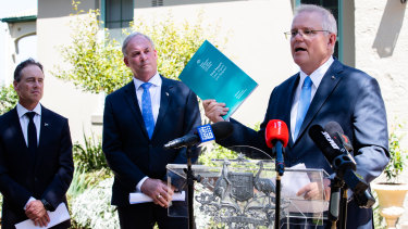 Prime Minister Scott Morrison, Health Minister Greg Hunt (left) and Aged Care Minister Richard Colbeck (centre) at the release of the final report of the Royal Commission into Aged Care Quality and Safety on March 1.