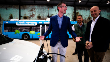 Treasurer Dominic Perrottet, Minister for Transport and Roads Andrew Constance, and Minister for Energy and Environment Matt Kean at the EV policy launch in June.