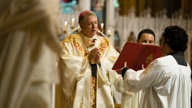 Catholic Archbishop of Sydney, Anthony Fisher, at the Christmas service at St Mary's Cathedral.