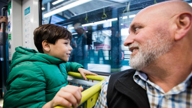Tod Sarina and son Daniel, 7, from Windsor Downs, on a metro train.