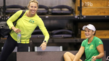 Mates: Molik and Barty relax during Fed Cup preparations last year. 